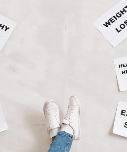 Inspirational health and fitness messages with shoe-clad feet, promoting healthy habits and wellbeing.